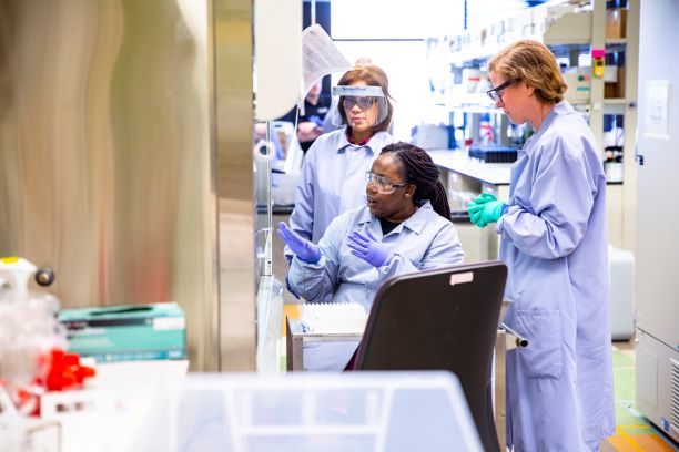 Three researchers in the lab